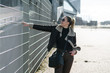 © Mila - Outdoor portrait of smiling happy woman wearing stylish outfit and walking, sunshine