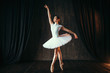 Graceful ballerina dancing in ballet class