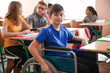 © Africa Studio - Boy in wheelchair in classroom at school