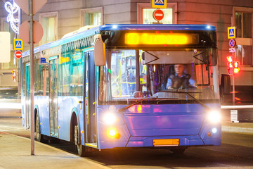 Poster - Moscow, Russia - March, 23, 2018: Landscape with the image of night Moscow with a bus on a frontground