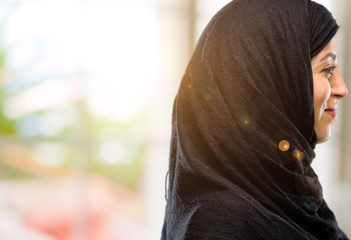 Young arab woman wearing hijab side view portrait