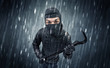 © ra2 studio - Burglar in action in black clothes with rainy concept.