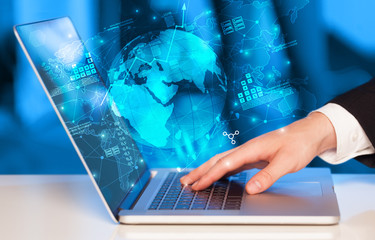 Poster - Hand using laptop with global reports and stock market change concept
