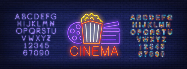Aufkleber - Cinema and alphabet neon sign set. Popcorn box, film reel, clapper board, violet colorful letters and numbers. Night bright advertisements. Vector illustrations in neon style for online movie