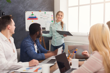 Aufkleber - Woman giving presentation to colleagues in office