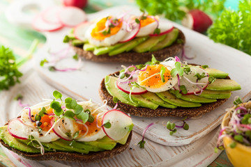 Wall Mural - Open sandwiches with avocado and egg