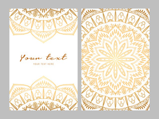 Wall Mural - Greeting card golden ethnic patterns on white background