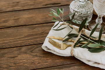 Rustic Wedding. Decorated table with vintage cutlery.