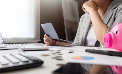 Wall Mural - Stressed Woman holding account passbook.