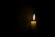 © Oleksii - Candle in the dark. Smoke from a candle.