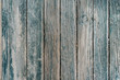 Old wooden barn board with a distressed surface.