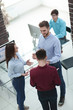 © ASDF - Business people listening to young man explanations.