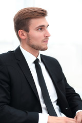 Canvas Print - closeup .portrait of a businessman sitting on a chair