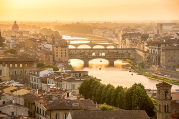 Fototapete - Aerial view of Florence at sunset  with the Ponte Vecchio and the Arno river, Tuscany, Italy