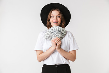 Sticker - Portrait of a satisfied young woman dressed in black hat