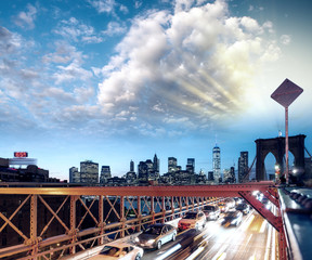 Sticker - Speeding cars on Brooklyn Bridge, New York City. Urban living and transportation concept