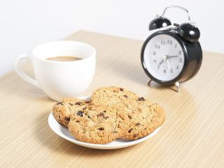 homemade chocolate chip cookies and coffee on the table