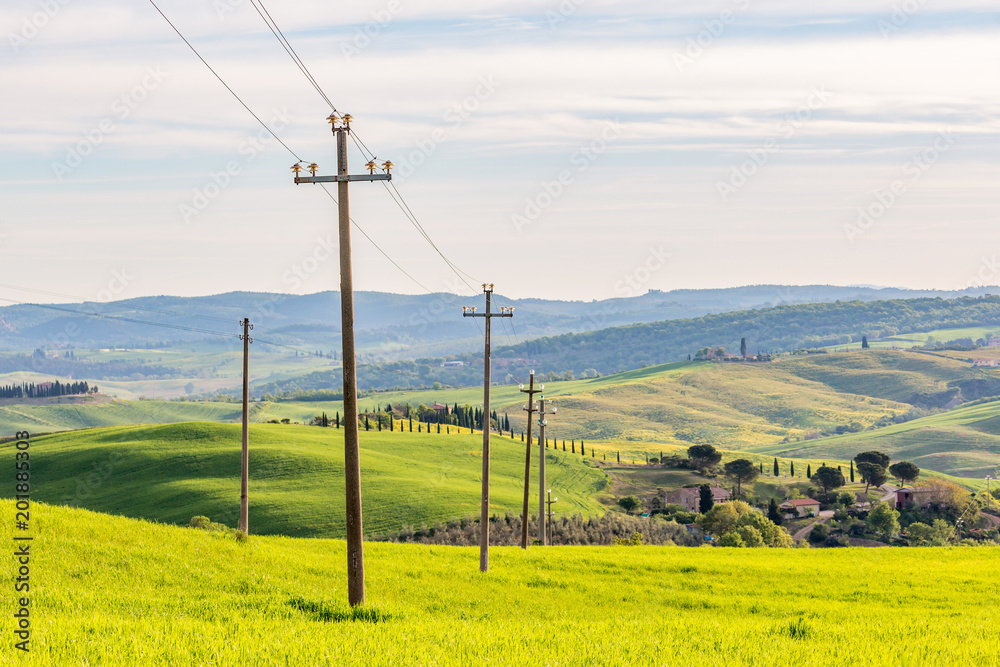 Power line in a field at a rural landscape Stock Photo | Adobe Stock