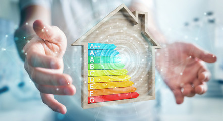 Wall Mural - businessman using 3d rendering energy rating chart in a wooden house