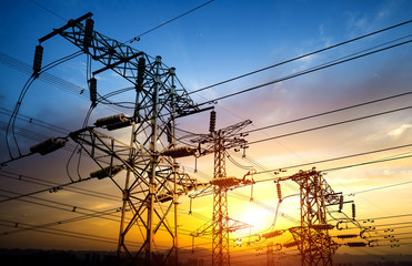 High pressure wire tower at sunset at dusk