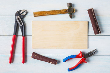 Tools and wooden plank with copy space.