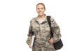 Female airman with shoulder bag and books