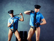 striptease dancers policemen