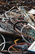 © Mary Abramkina - old broken bicycles in a pile of metal and junk vintage rusted scrap prices trash