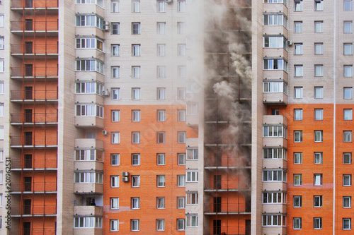 Russia, Saint-Petersburg - 28 march. High-rise condominium or apartment burning. Fire in apartments of a large tenement-house. Fire on several floors, the smoke comes out of the windows.