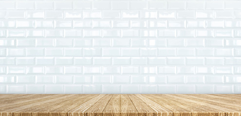 Wall Mural - wood plank table top at white glossy ceramic tile wall background,mock up for display or montage of 