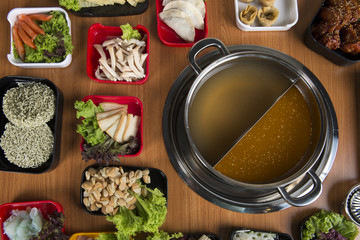 Wall Mural -  hot pot with double flavour flat lay view