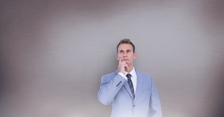 Wall Mural - Woman thinking in front of wall