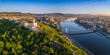 Budapest, Hungary - Aerial panoramic skyline view of Budapest at sunrise. This view includes the Statue of Liberty, Elisabeth Bridge, Buda Castle Royal Palace and Szechenyi Chain Bridge with blue sky