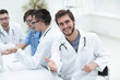 © ASDF - friendly doctor making a welcome gesture