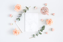 Wedding Invitation Card. Marble Paper Blank, Rose Flowers, Eucalyptus Branches On Gray Background. Wedding Concept. Flat Lay, Top View, Copy Space