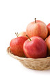 Apples in a basket on white background