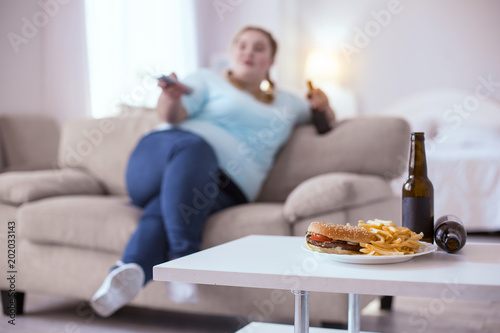 Unhealthy Food Greasy Junk Food Standing On The Table Waiting To