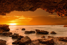 Sunrise At The Sea From A Cave