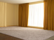 © Showtime Networks - Yellow curtain around large sunny window in empty room