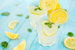 Refreshing drinks for summer, cold  lemonade juice with sliced fresh lemons