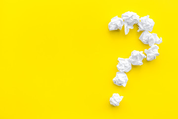 Poster - Question mark lined with crumpled paper on yellow background top view copy space