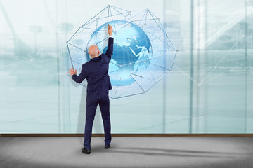 Poster - Man holding a 3d rendering pin holder on a map