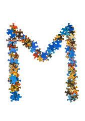 Poster - Letter M made of puzzle pieces