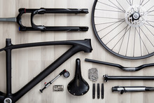 Photo Of Bicycle Objects On Wooden Background.