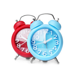 Poster - Alarm clocks on white background. Time change concept