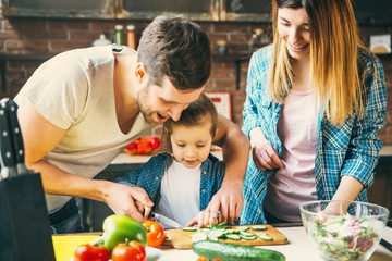 Wall Mural - Family cook together in the kitchen.