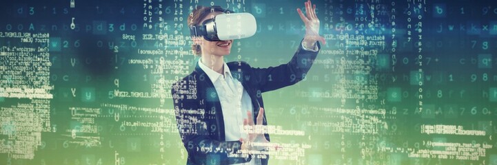 Poster - Composite image of happy businesswoman working with vr