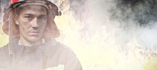 Poster - Composite image of serious fireman