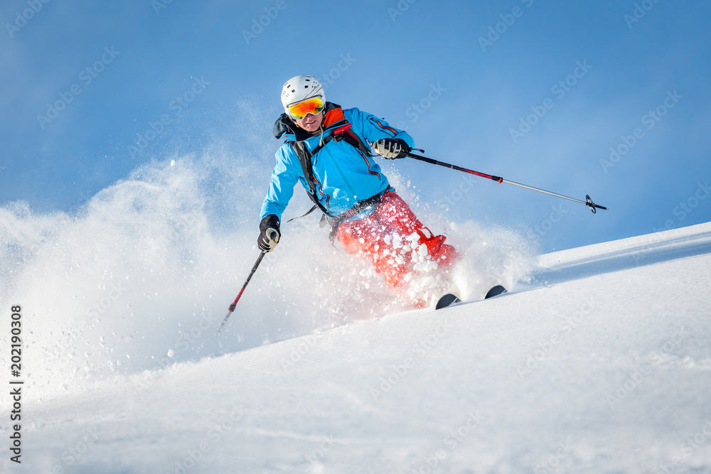 Male freeride skier in the mountains off-piste - obrazy, fototapety, plakaty 