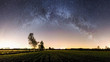 © Piotr Jankowiak - Panorama of a milky way over fields